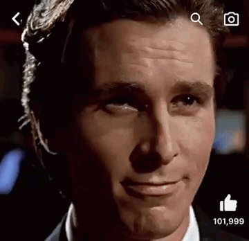 A Close Up Of A Man 'S Face With A Thumbs Up Sign . GIF