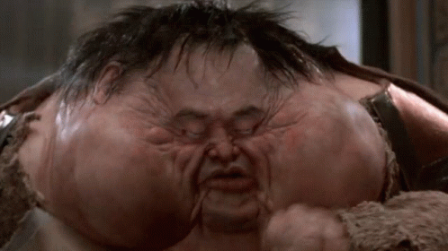 A Close Up Of A Man 'S Face With A Very Large Nose GIF