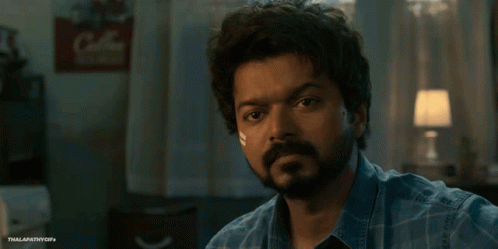 A Close Up Of A Man 'S Face With A Watermark That Says Thalapathyoff GIF