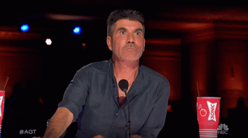 A Close Up Of A Man 'S Face With #Agt Written On The Bottom Right GIF