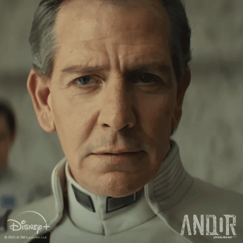 Close Up Of Man's Face Andor Star Wars Text GIF
