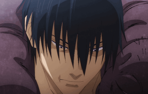 A Close Up Of A Man 'S Face With Black Hair GIF