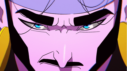 A Close Up Of A Man 'S Face With Blue Eyes And A Mustache GIF