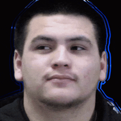 a close up of a man 's face with blue lines around his head