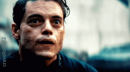 A Close Up Of A Man 'S Face With Crawling 032 Written In The Corner GIF