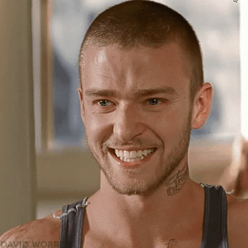 A Close Up Of A Man 'S Face With David Worrell Written On The Bottom Right GIF