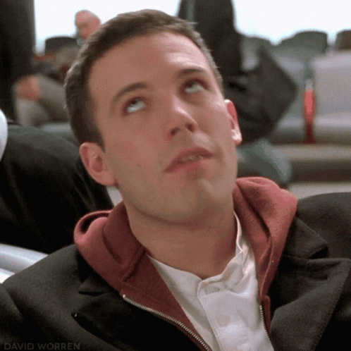 A Close Up Of A Man 'S Face With David Worren Written On The Bottom Right GIF