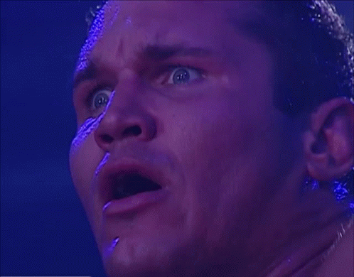 A Close Up Of A Man 'S Face With Half Of It Covered In Frosting GIF