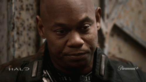 A Close Up Of A Man 'S Face With Halo On The Bottom GIF