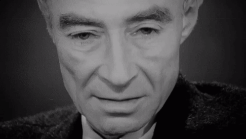 A Close Up Of A Man 'S Face With His Eyes Closed GIF