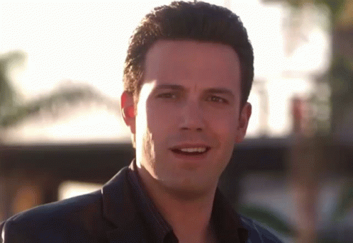 A Close Up Of A Man 'S Face With His Eyes Closed GIF