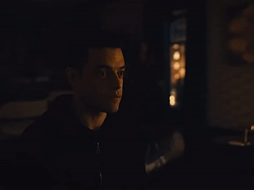 A Close Up Of A Man 'S Face With His Eyes Closed GIF