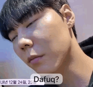 A Close Up Of A Man 'S Face With His Eyes Closed And A Sticker That Says Dafug . GIF