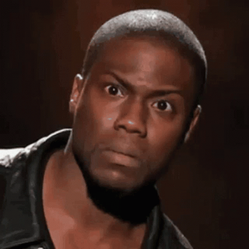 A Close Up Of A Man 'S Face With His Eyes Wide Open GIF