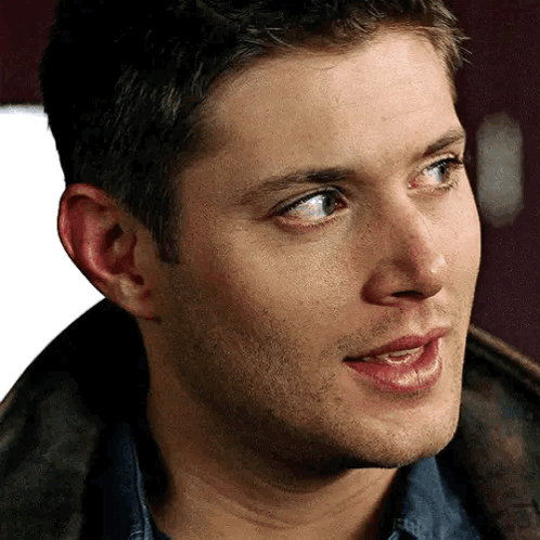A Close Up Of A Man 'S Face With His Mouth Open And A Beard . GIF