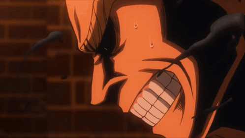 a close up of a man 's face with his mouth open and sweat coming out of his nose