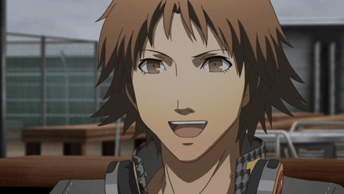 A Close Up Of A Man 'S Face With His Mouth Open GIF