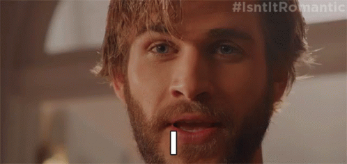 A Close Up Of A Man 'S Face With #Isntltromantic On The Bottom GIF
