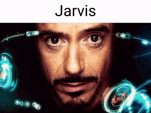 A Close Up Of A Man 'S Face With Jarvis Written Above It GIF