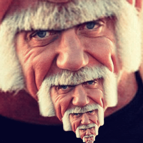 A Close Up Of A Man 'S Face With Multiple Faces GIF