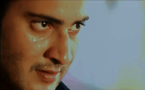 A Close Up Of A Man 'S Face With Sweat Coming Out Of His Nose GIF