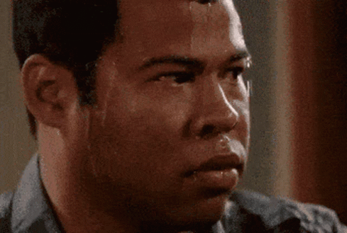 A Close Up Of A Man 'S Face With Sweat Coming Out Of His Nose GIF