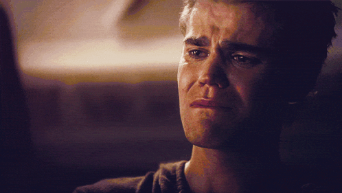 A Close Up Of A Man 'S Face With Tears Coming Out Of His Eyes GIF