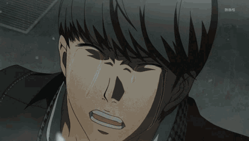 A Close Up Of A Man 'S Face With Tears Coming Out Of It GIF