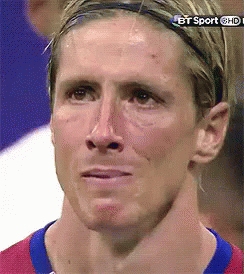 A Close Up Of A Man 'S Face With The Bt Sport Logo On The Bottom GIF