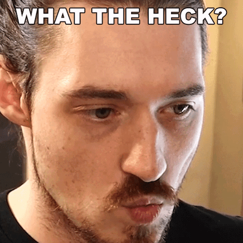 Close Up Of Man's Face With What The Heck Caption GIF