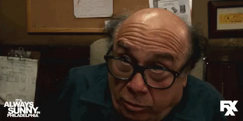 A Close Up Of A Man 'S Face With The Fx Logo In The Background GIF