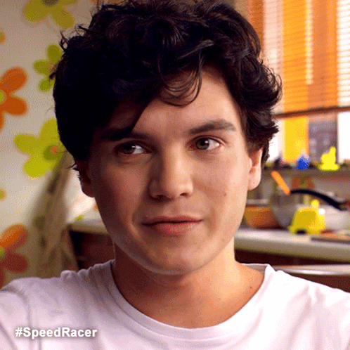 A Close Up Of A Man 'S Face With The Hashtag #Speedracer Visible GIF