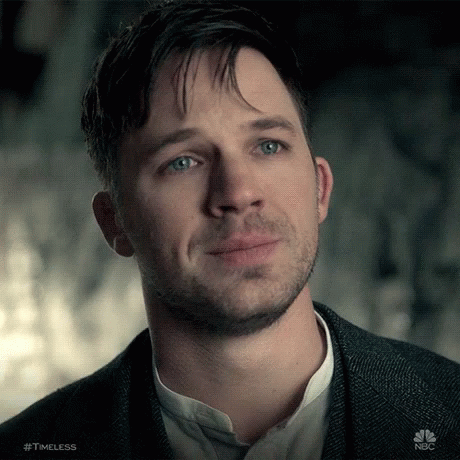 A Close Up Of A Man 'S Face With The Hashtag Timeless GIF