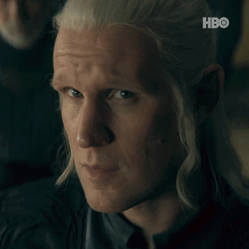 A Close Up Of A Man 'S Face With The Hbo Logo In The Background GIF