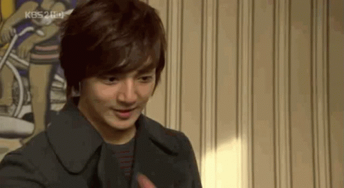 A Close Up Of A Man 'S Face With The Kbs2 Hd Logo On The Bottom Right GIF