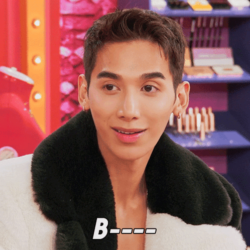 A Close Up Of A Man 'S Face With The Letter B Below It GIF