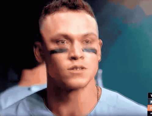 A Close Up Of A Man 'S Face With The Letter N On The Bottom Left GIF