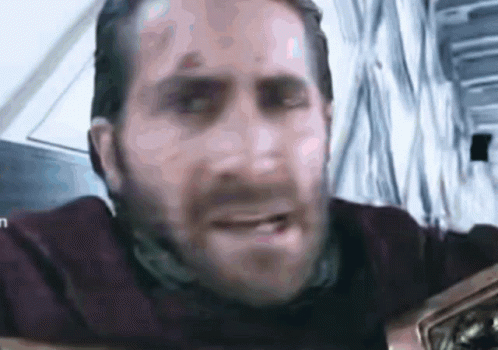 A Close Up Of A Man 'S Face With The Letter N On The Bottom GIF