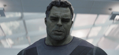 A Close Up Of A Man 'S Face With The Letter N Visible GIF