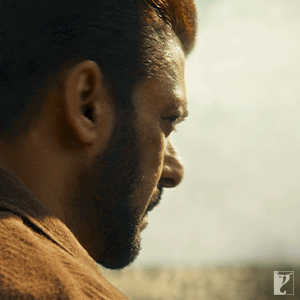 A Close Up Of A Man 'S Face With The Letter P On The Bottom GIF