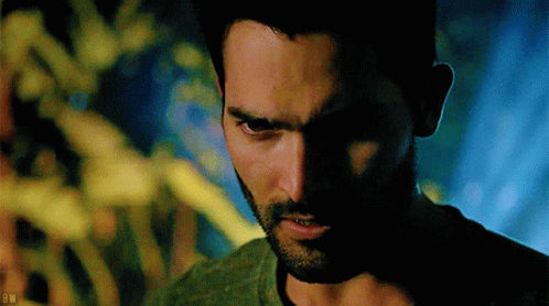 A Close Up Of A Man 'S Face With The Letters Bw On The Bottom Left GIF