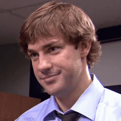 A Close Up Of A Man 'S Face With The Name David Worren Visible GIF