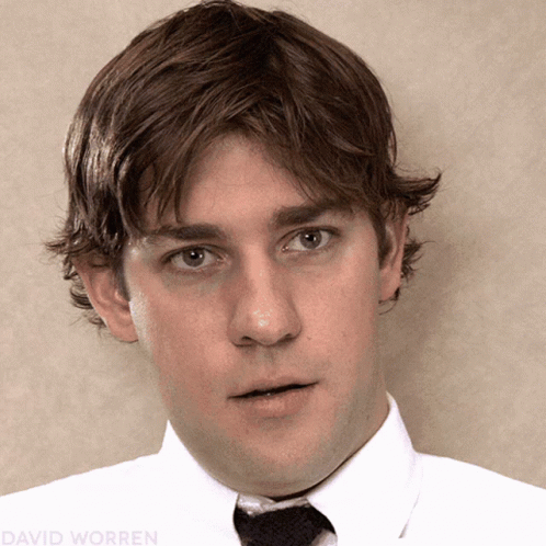 A Close Up Of A Man 'S Face With The Name David Worren Visible GIF