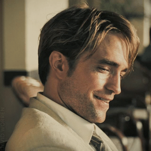 A Close Up Of A Man 'S Face With The Name David Written On The Bottom Right GIF