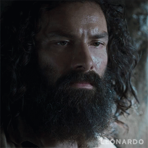 A Close Up Of A Man 'S Face With The Name Leonardo On The Bottom Right GIF