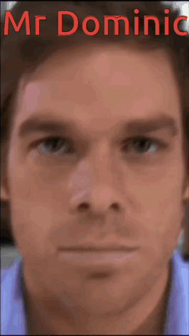 A Close Up Of A Man 'S Face With The Name Mr. Dominic Written In Red GIF