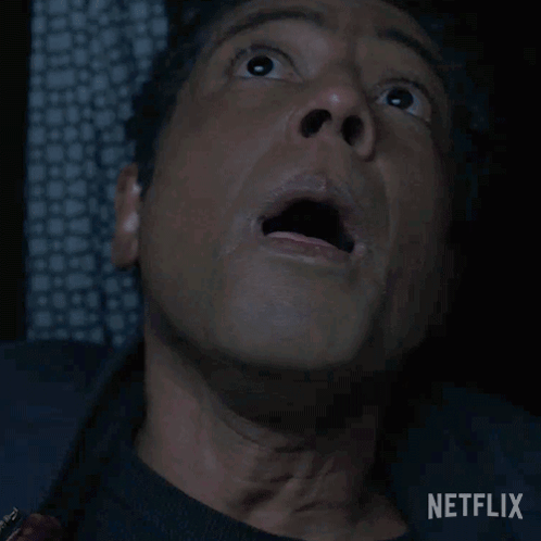 A Close Up Of A Man 'S Face With The Netflix Logo In The Corner GIF