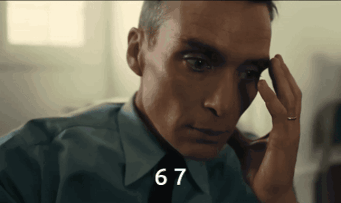 A Close Up Of A Man 'S Face With The Number 67 Visible GIF