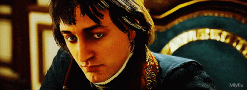 A Close Up Of A Man 'S Face With The Watermark Miyku On The Bottom Left GIF