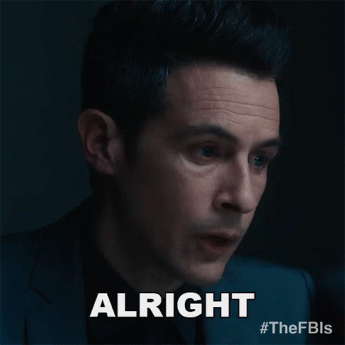 A Close Up Of A Man 'S Face With The Word Alright In White Letters GIF